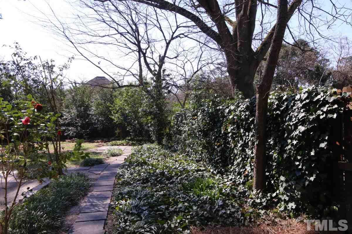 1011 Peace Street Raleigh, NC 27605 - Photo 24 of 25 a view of a yard with large trees