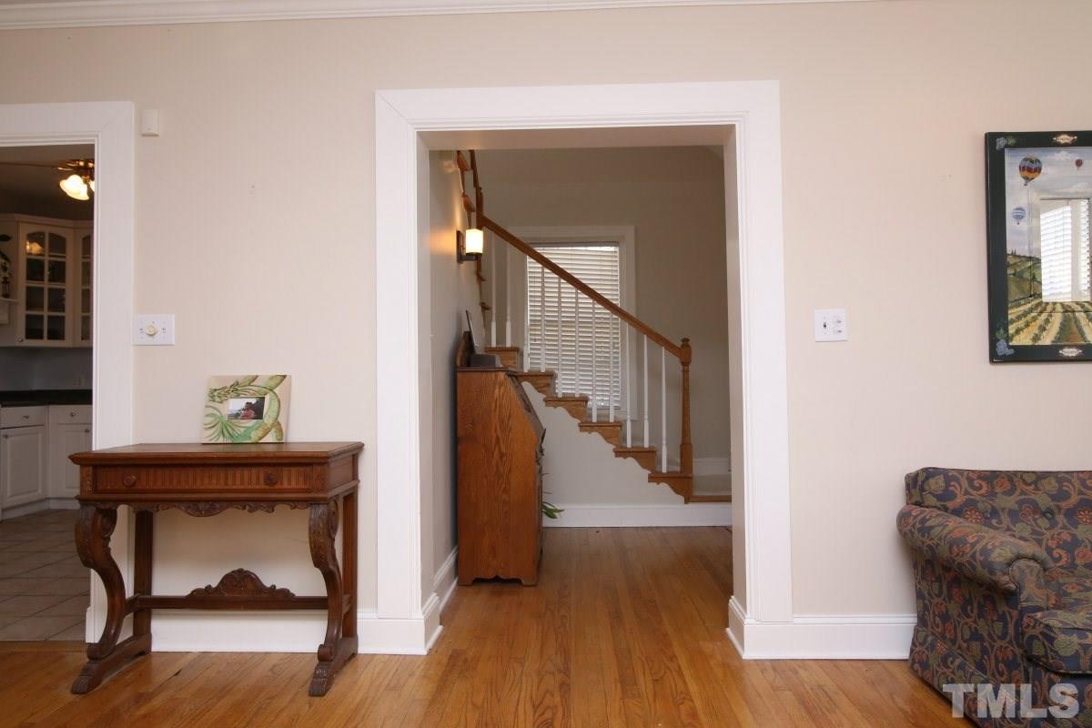 1011 Peace Street Raleigh, NC 27605 - Photo 4 of 25 a view of entryway and hall with wooden floor