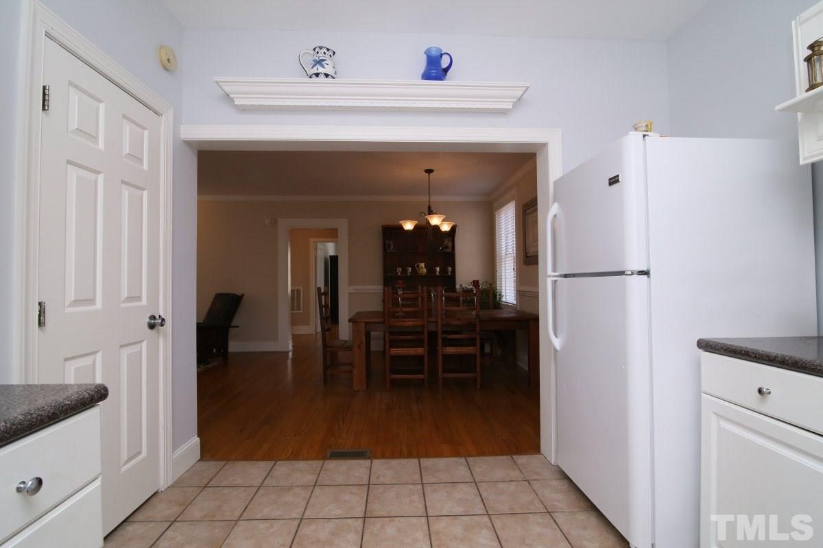 1011 Peace Street Raleigh, NC 27605 - Photo 6 of 25 a view of kitchen with furniture and large window
