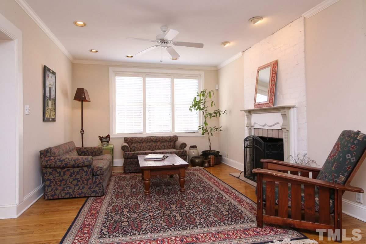 1011 Peace Street Raleigh, NC 27605 - Photo 9 of 25 a living room with furniture fireplace and window