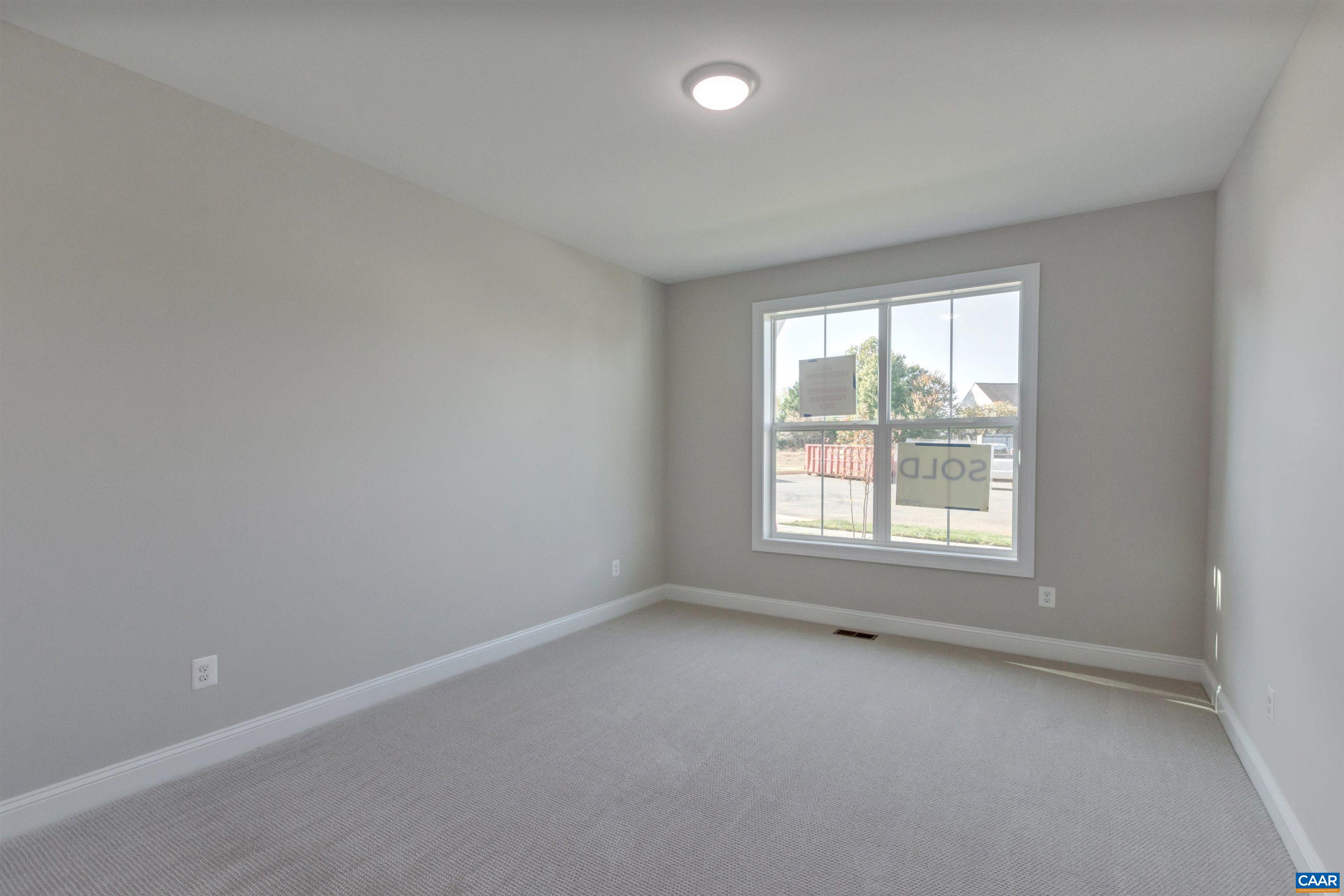 2519 Huntington Road Charlottesville, VA 22901 - Photo 31 of 47 an empty room with a window
