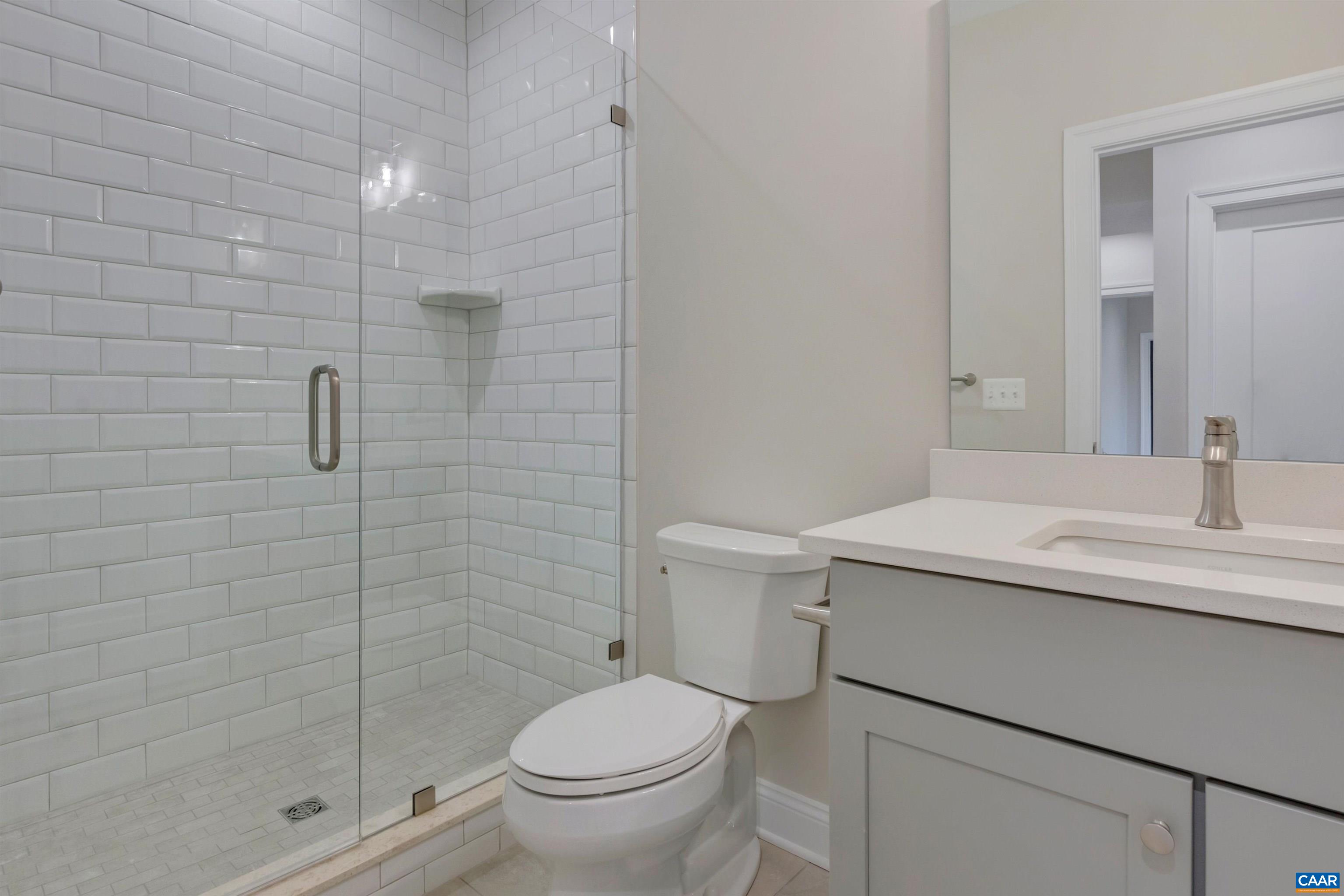2519 Huntington Road Charlottesville, VA 22901 - Photo 34 of 47 a bathroom with a sink a toilet and shower