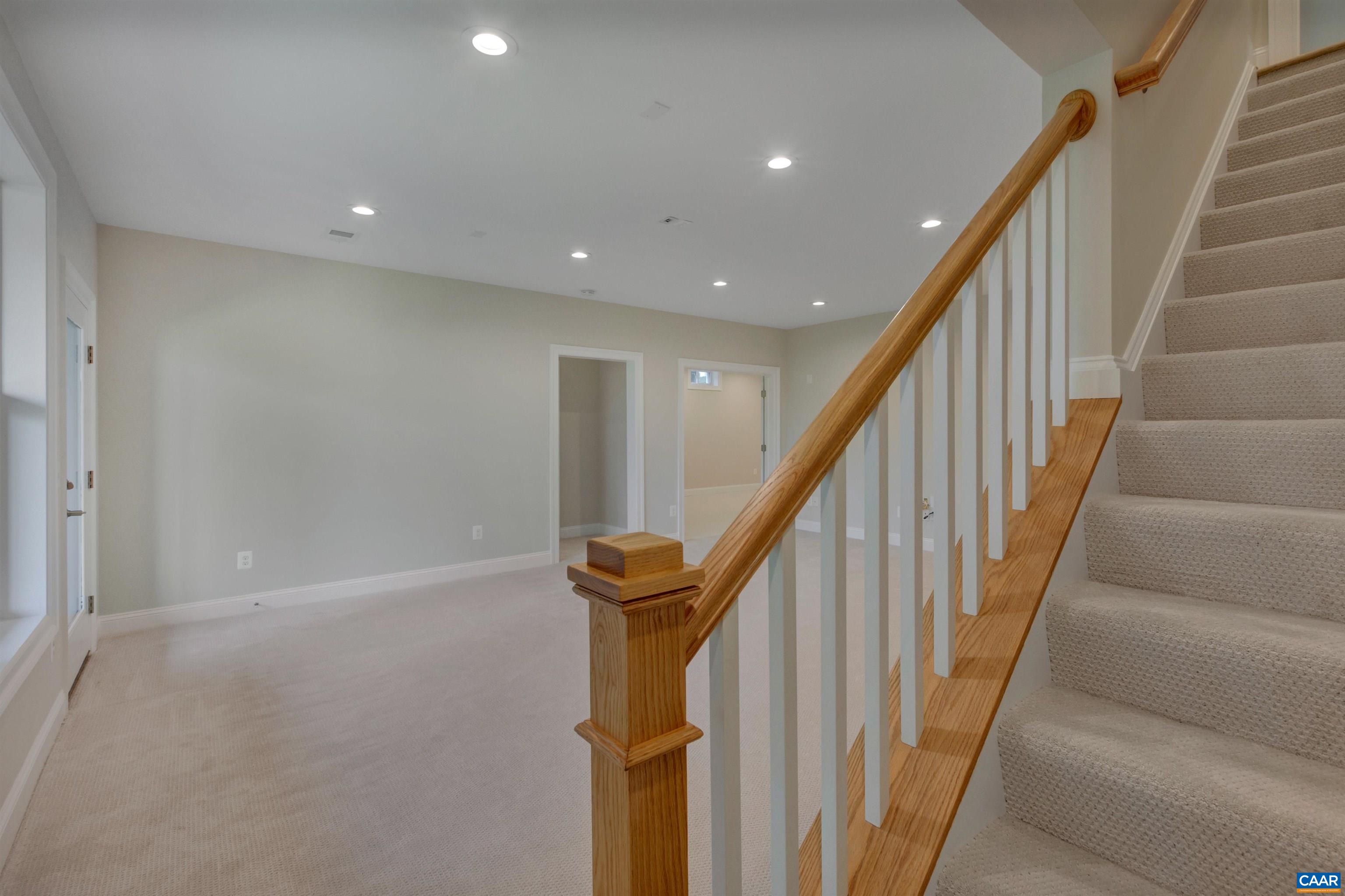 2519 Huntington Road Charlottesville, VA 22901 - Photo 38 of 47 a view of staircase with wooden floor and white walls