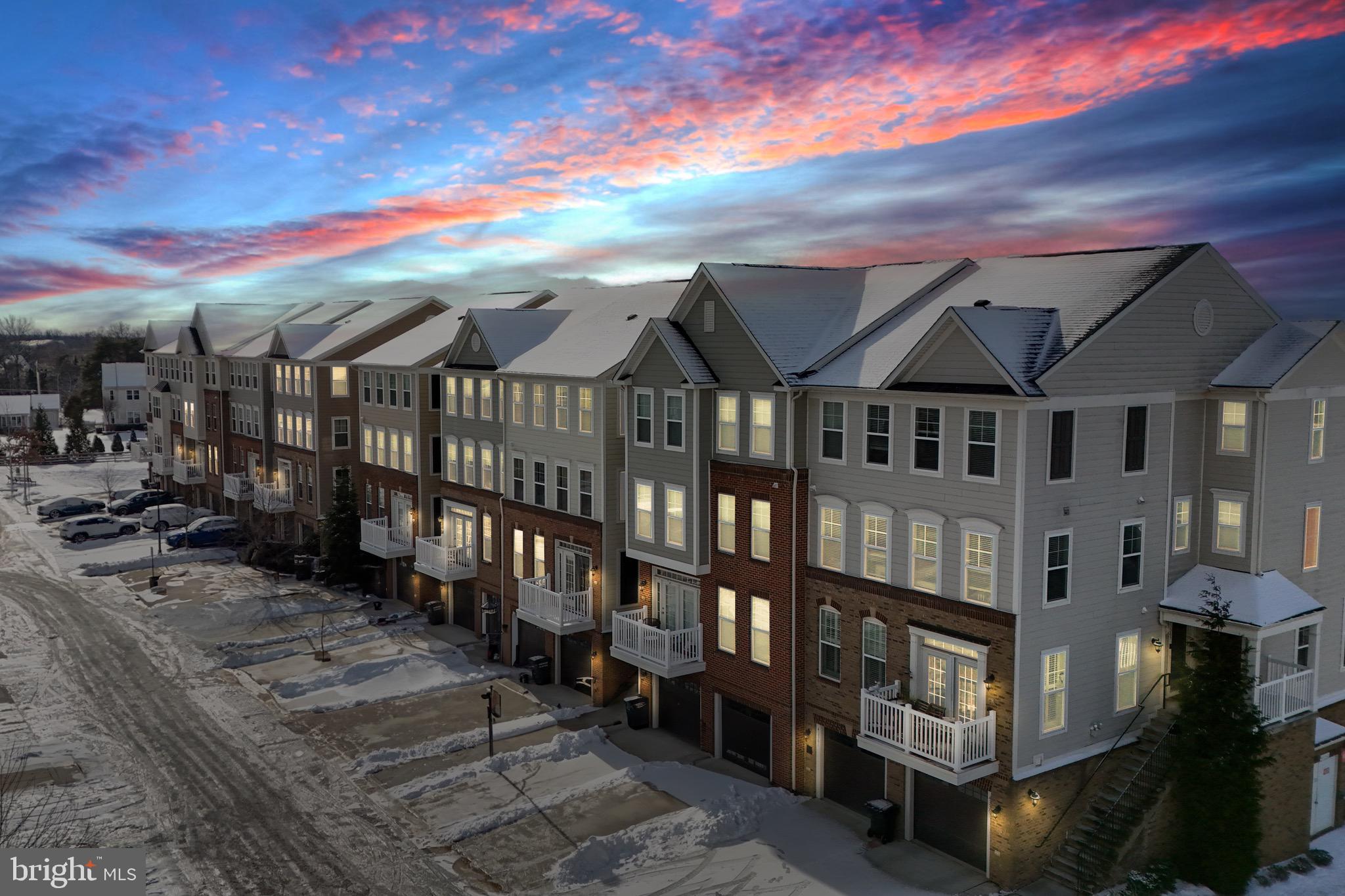 43367 Town Gate Square Chantilly, VA 20152 - Photo 1 of 36 a view of a houses with many windows