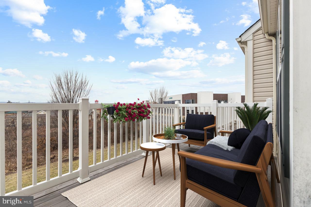 43367 Town Gate Square Chantilly, VA 20152 - Photo 11 of 36 a view of a balcony with furniture