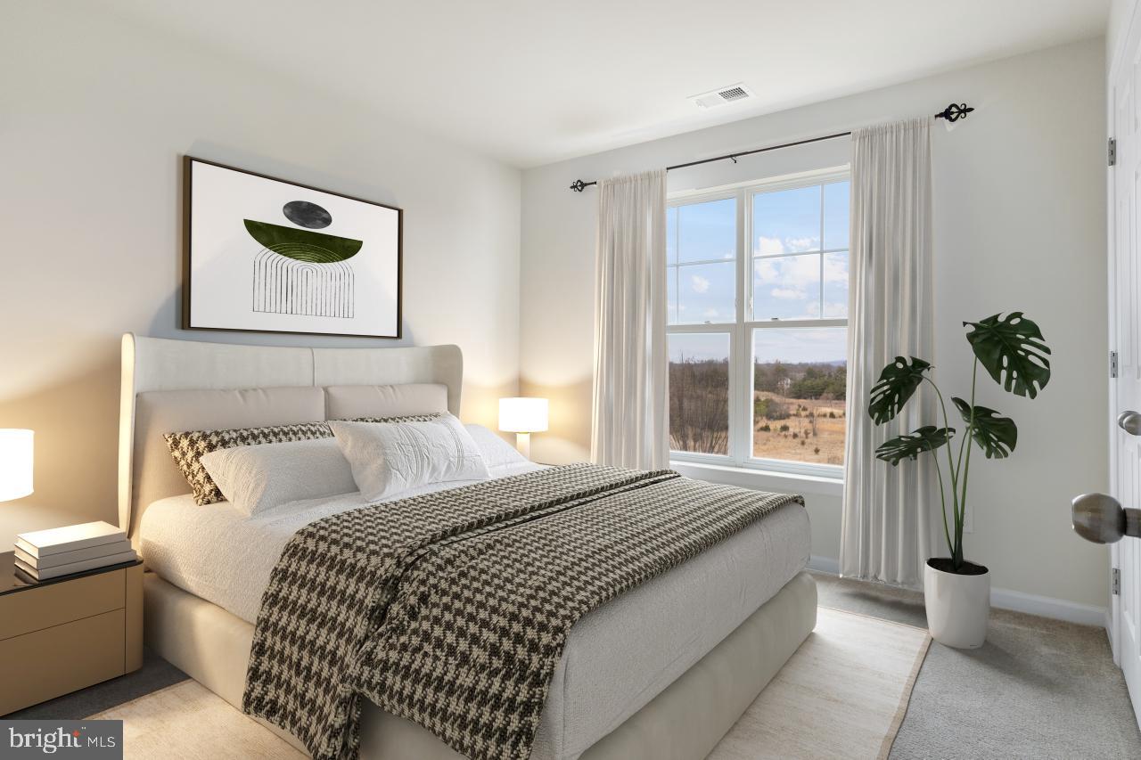 43367 Town Gate Square Chantilly, VA 20152 - Photo 23 of 36 a bedroom with bed and window