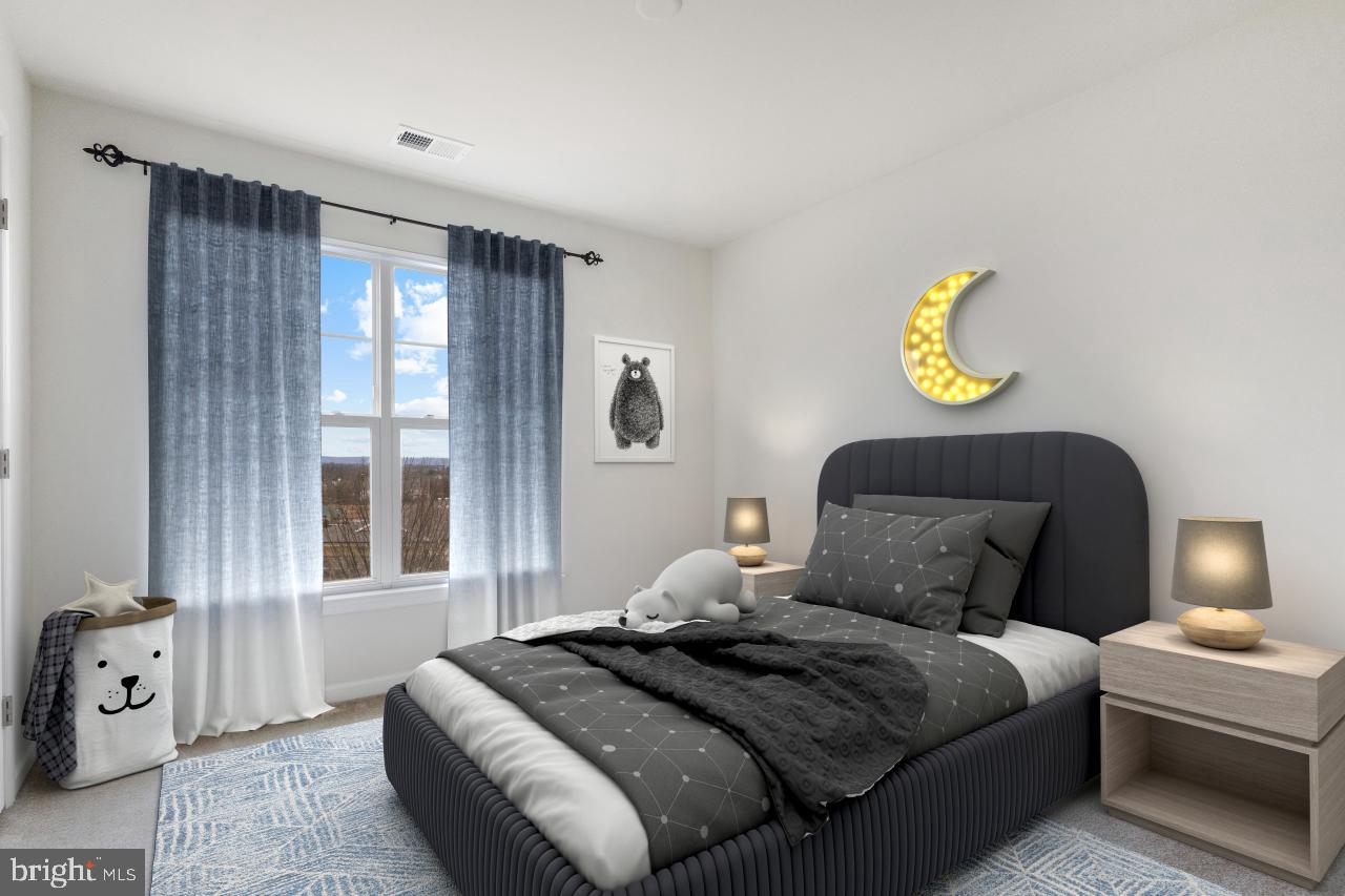 43367 Town Gate Square Chantilly, VA 20152 - Photo 25 of 36 a bedroom with a bed and a window
