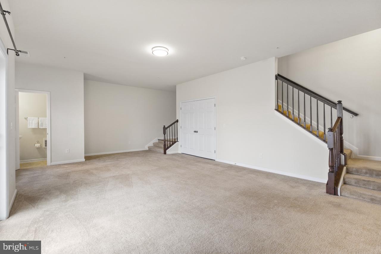 43367 Town Gate Square Chantilly, VA 20152 - Photo 31 of 36 a view of an empty room with stairs