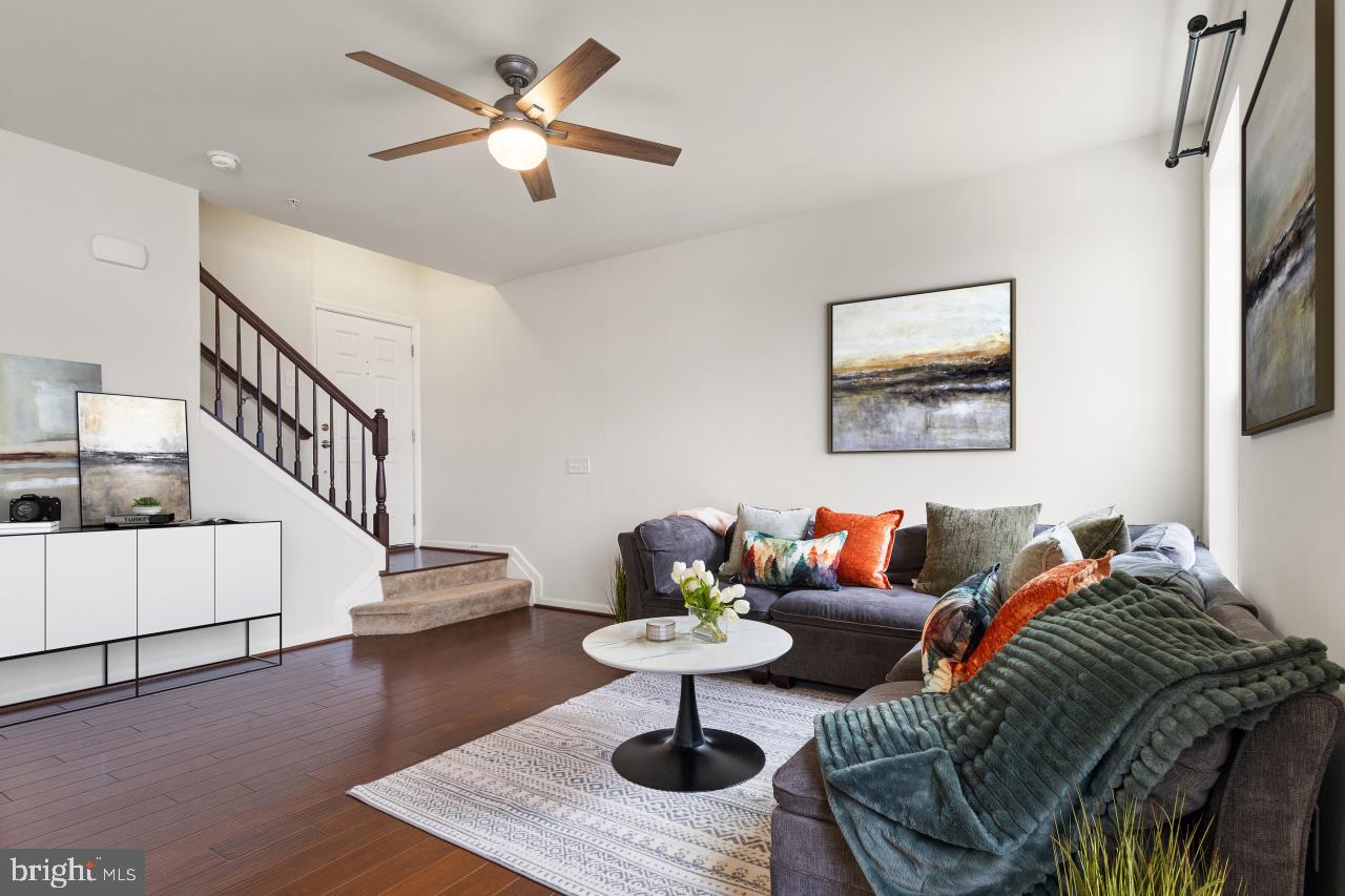 43367 Town Gate Square Chantilly, VA 20152 - Photo 5 of 36 a living room with furniture and a table