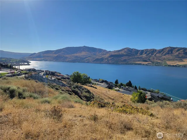 a view of a lake with mountains in the background
