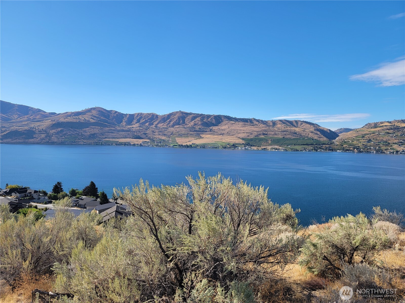 211 Viewland Way Chelan, WA 98816 - Photo 2 of 9 a view of a lake with a mountain in the background