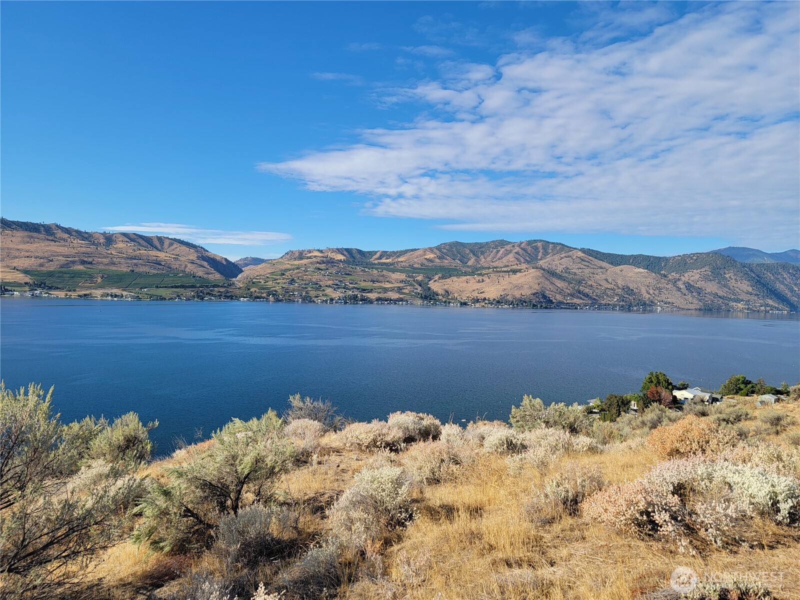 211 Viewland Way Chelan, WA 98816 - Photo 3 of 9 a view of a lake with mountain