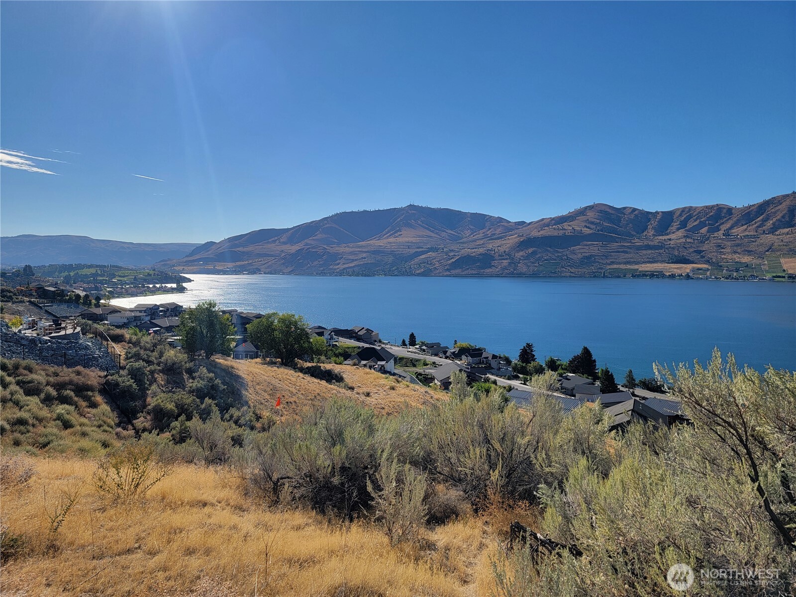 211 Viewland Way Chelan, WA 98816 - Photo 6 of 9 a view of a mountain with sunset in background