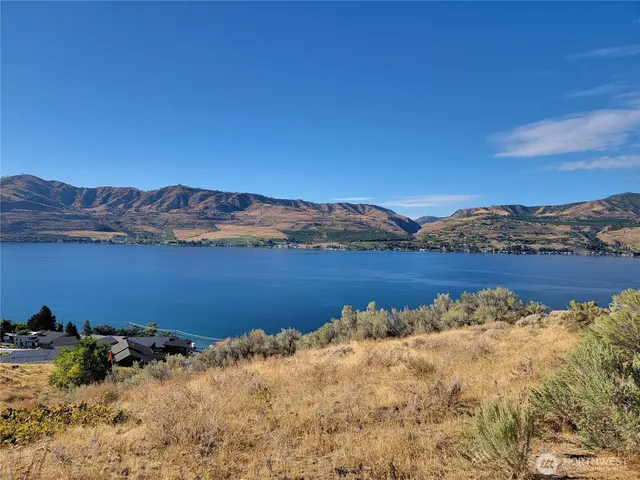 a view of a lake with mountains in the background