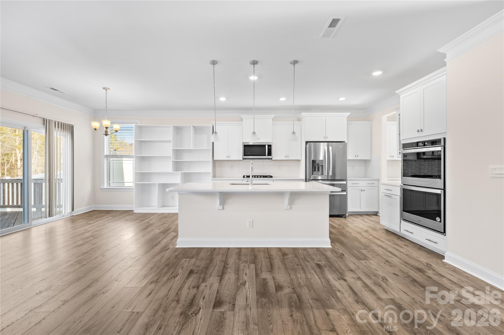 402 Preston Road Mooresville, NC 28117 - Photo 18 of 42 a view of kitchen with wooden floor and electronic appliances