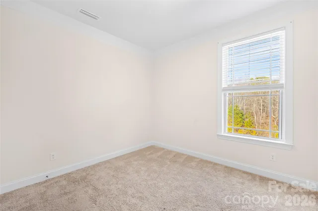 a bathroom with a granite countertop sink a toilet and bathtub