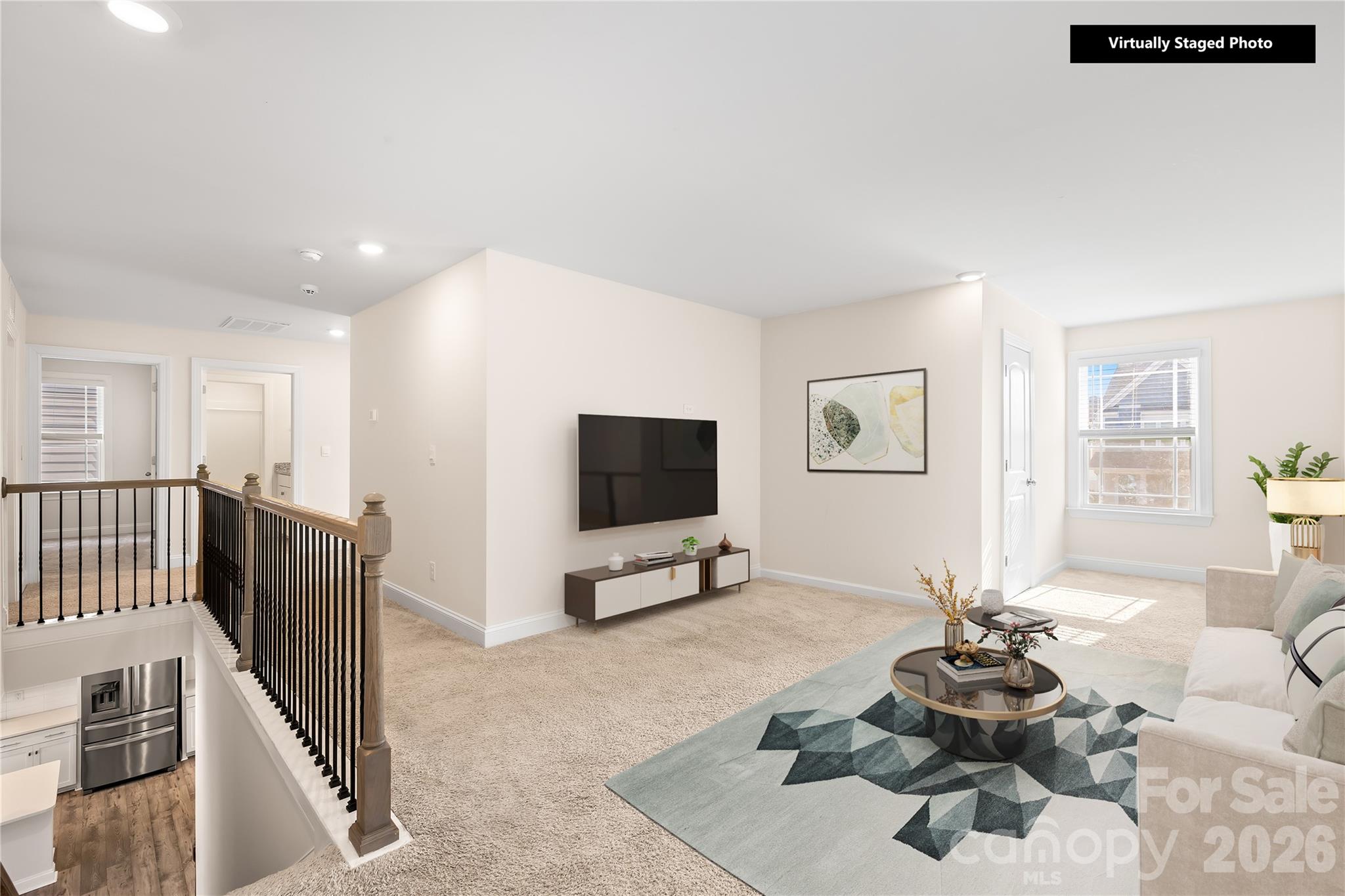 402 Preston Road Mooresville, NC 28117 - Photo 21 of 42 a living room with furniture and a flat screen tv