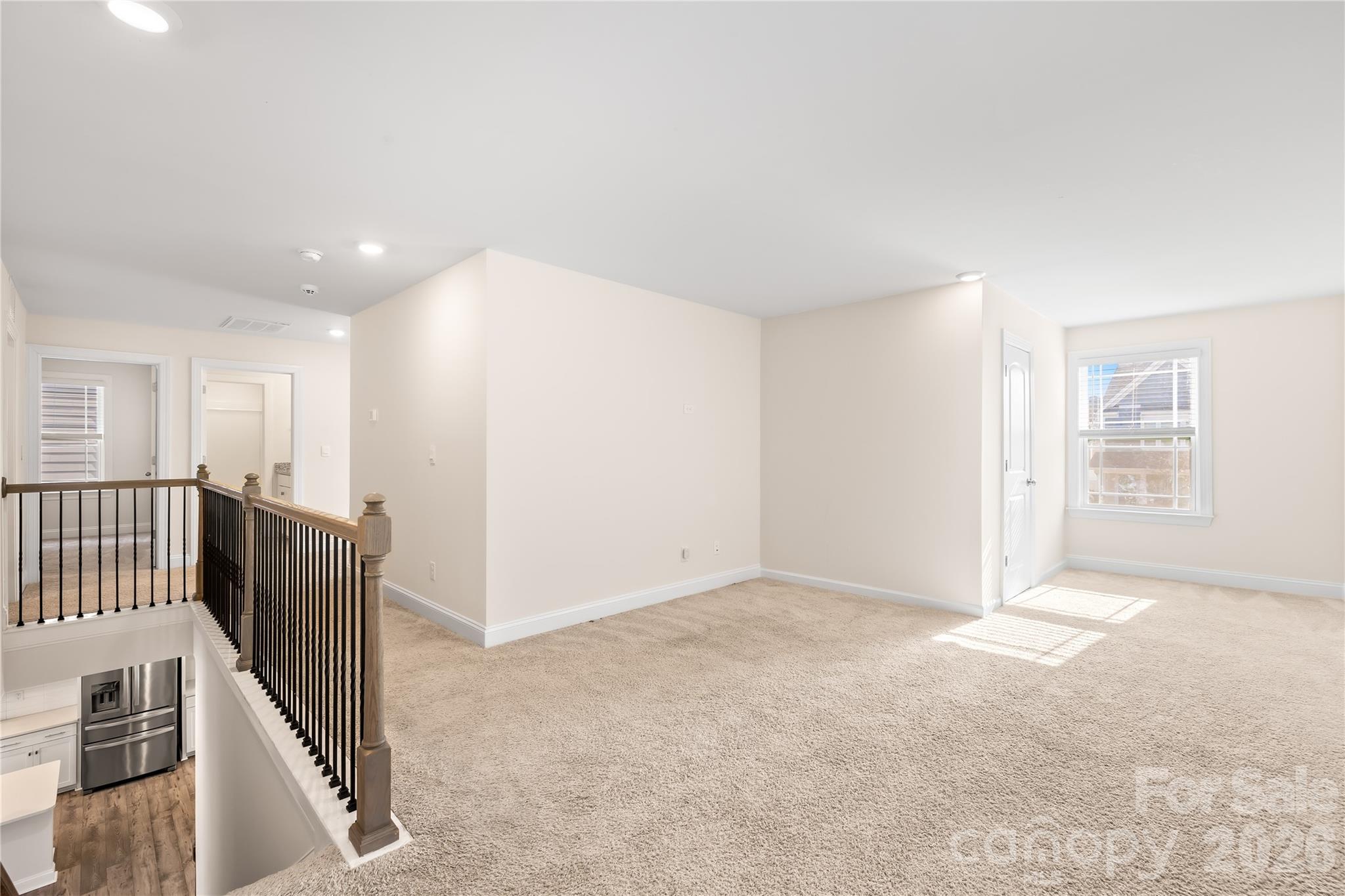 402 Preston Road Mooresville, NC 28117 - Photo 22 of 42 a view of an empty room with windows