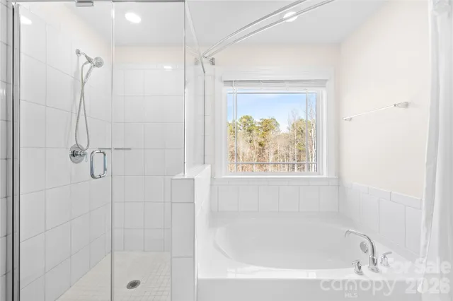 a bathroom with a granite countertop sink mirror and double