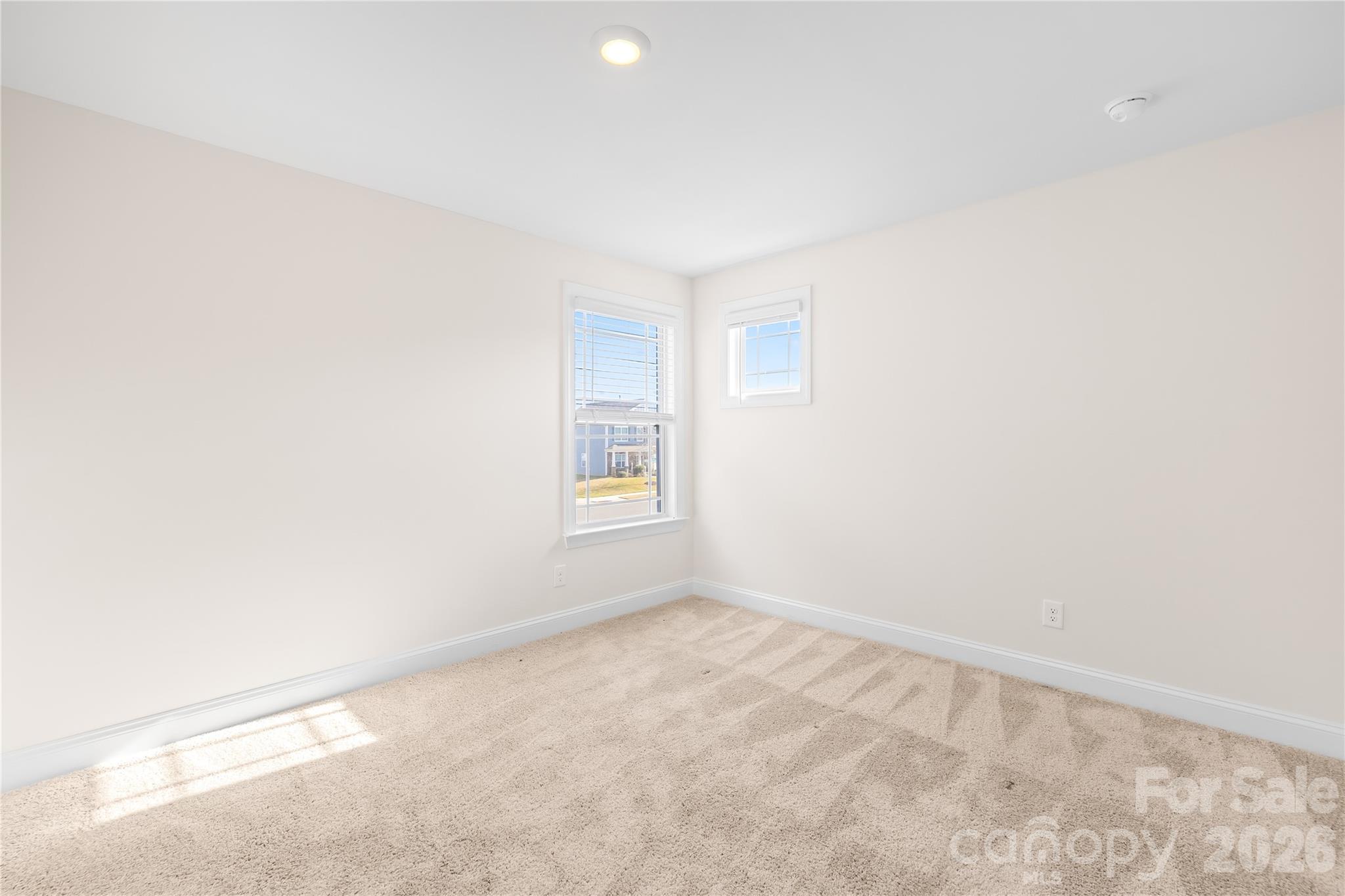 402 Preston Road Mooresville, NC 28117 - Photo 32 of 42 an empty room with a window