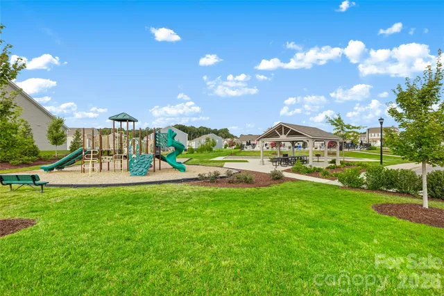 a view of a patio with chairs and tables