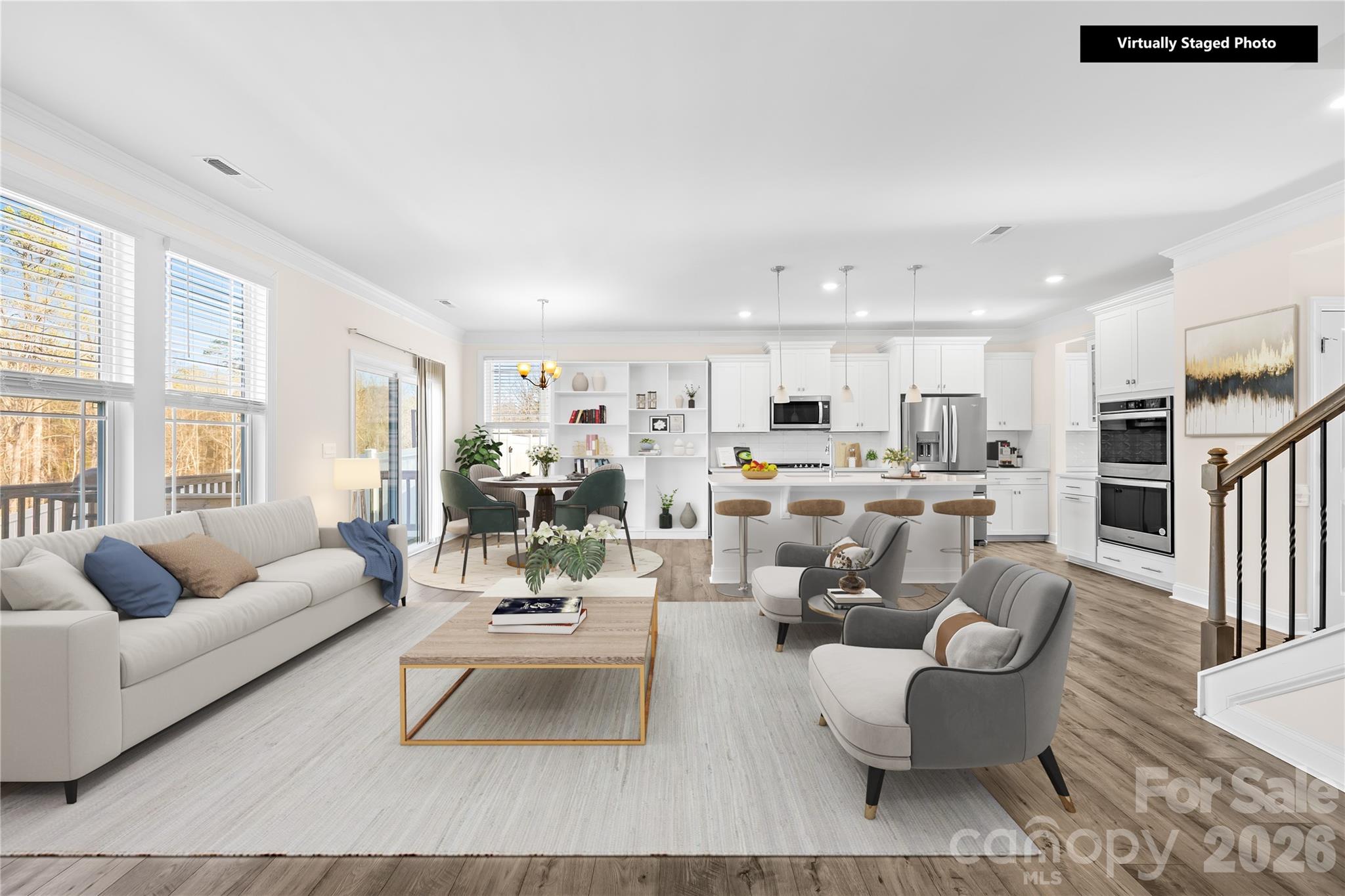 402 Preston Road Mooresville, NC 28117 - Photo 9 of 42 a living room with furniture and kitchen view