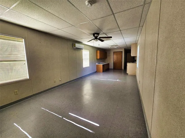 a view of a livingroom and a kitchen