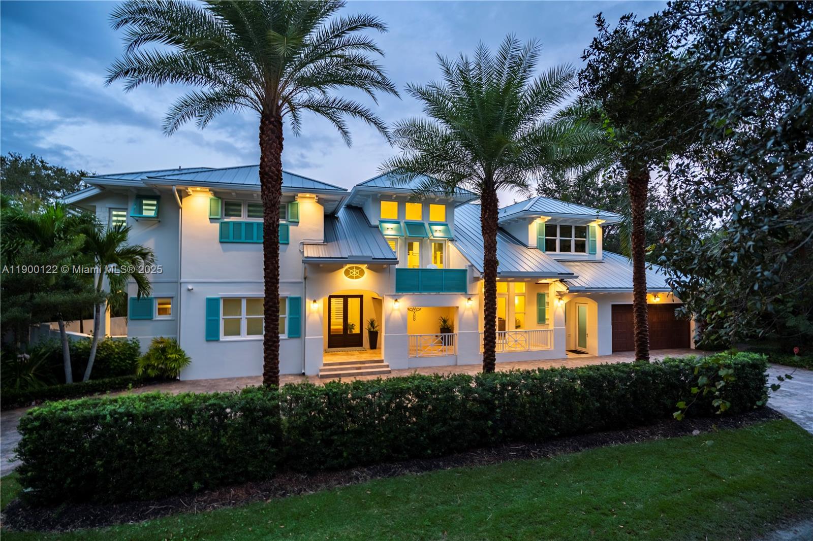 545 Southwest Indianola Street Stuart, FL 34994 - Photo 2 of 64 a front view of multiple houses with yard