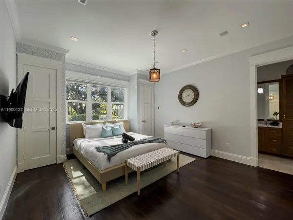 a view of a living room and chandelier