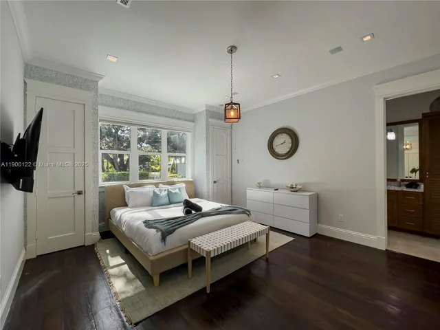 a view of swimming pool with outdoor seating and wooden floor