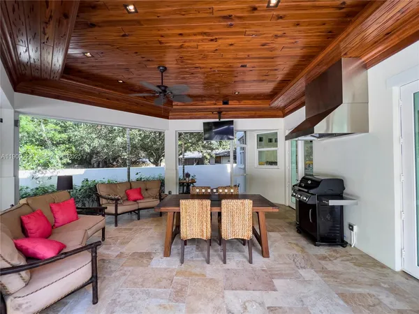 a view of a house with backyard porch and patio