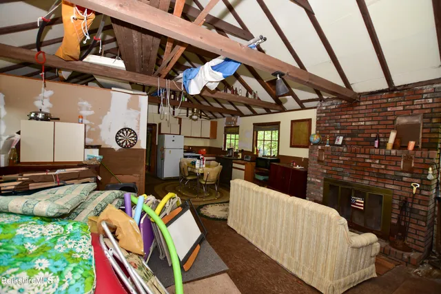 a view of a room with rack and windows