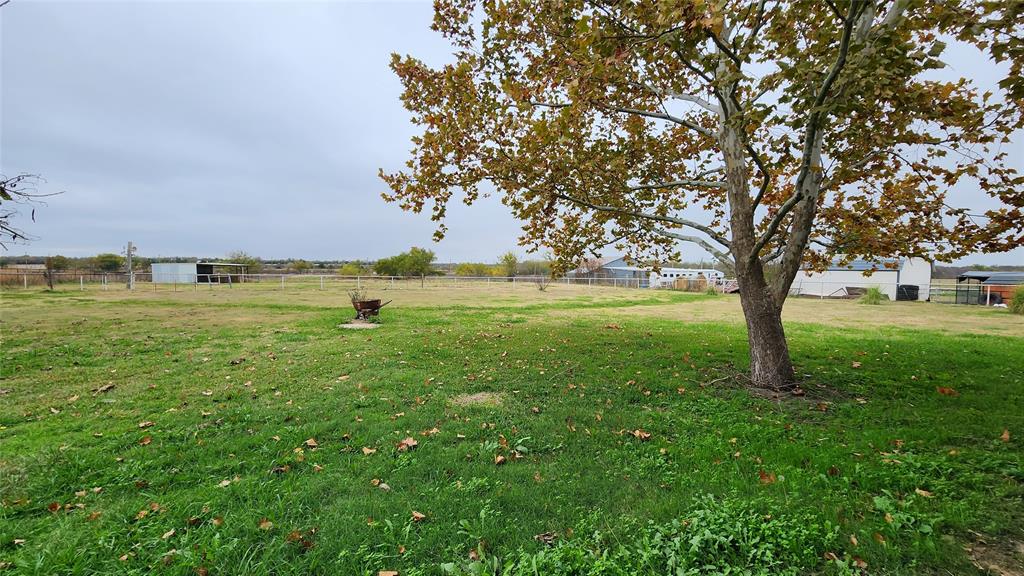 511 East Cook Street, Unit 1 Josephine, TX 75173 - Photo 18 of 36 View of yard featuring a rural view