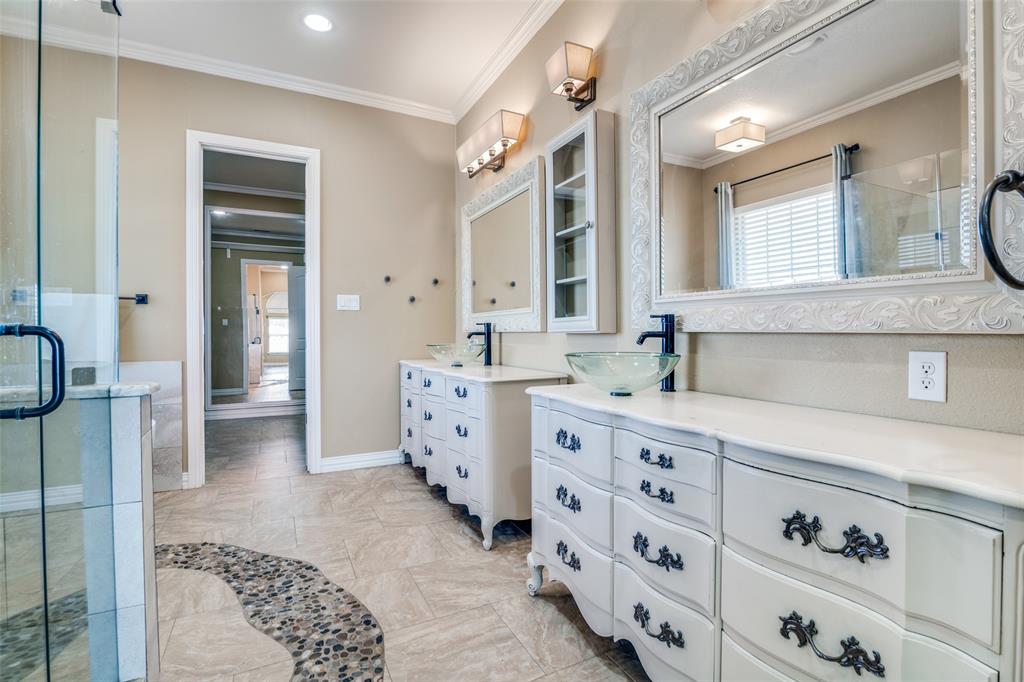 511 East Cook Street, Unit 1 Josephine, TX 75173 - Photo 23 of 29 a spacious bathroom with double vanity sink and a mirror