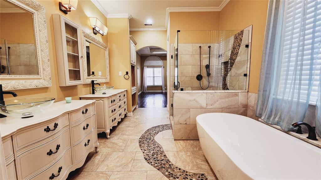 511 East Cook Street, Unit 1 Josephine, TX 75173 - Photo 23 of 36 a spacious bathroom with a tub sink and mirror