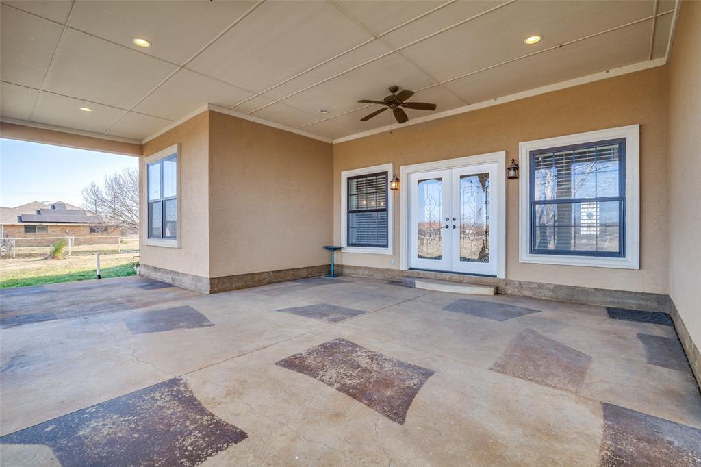 511 East Cook Street, Unit 1 Josephine, TX 75173 - Photo 27 of 29 a view of a livingroom with a ceiling fan and window