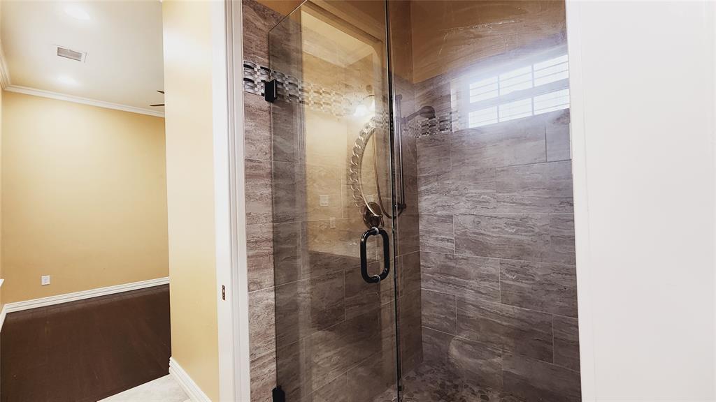 511 East Cook Street, Unit 1 Josephine, TX 75173 - Photo 29 of 36 a bathroom with a shower