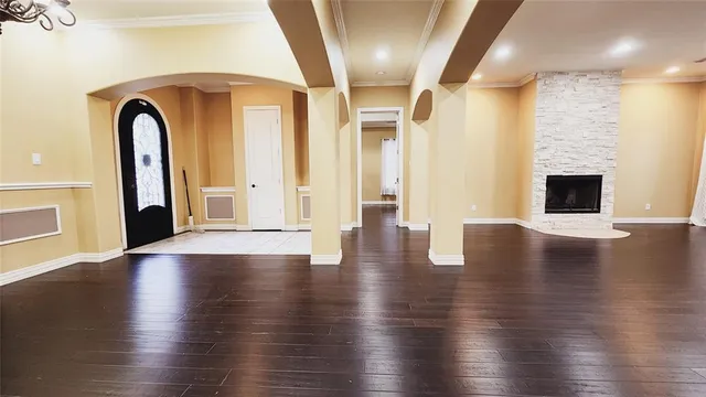 a kitchen with a sink appliances and cabinets