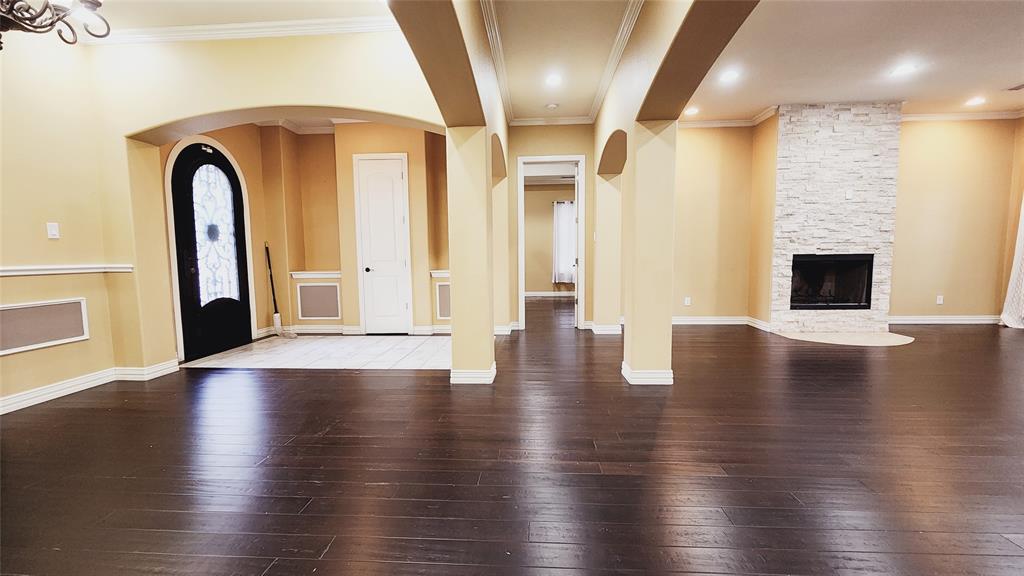 511 East Cook Street, Unit 1 Josephine, TX 75173 - Photo 7 of 36 a view of empty room with wooden floor