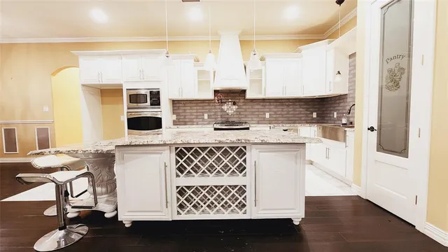 a view of a living room and dining room