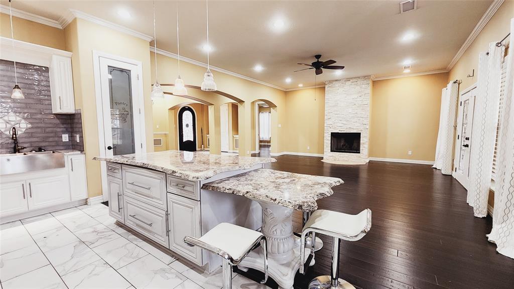 511 East Cook Street, Unit 1 Josephine, TX 75173 - Photo 10 of 36 a large kitchen with a table and chairs