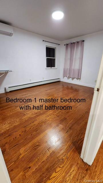 133 Railroad Avenue, Unit 2 Syosset, NY 11791 - Photo 7 of 11 a view of an empty room