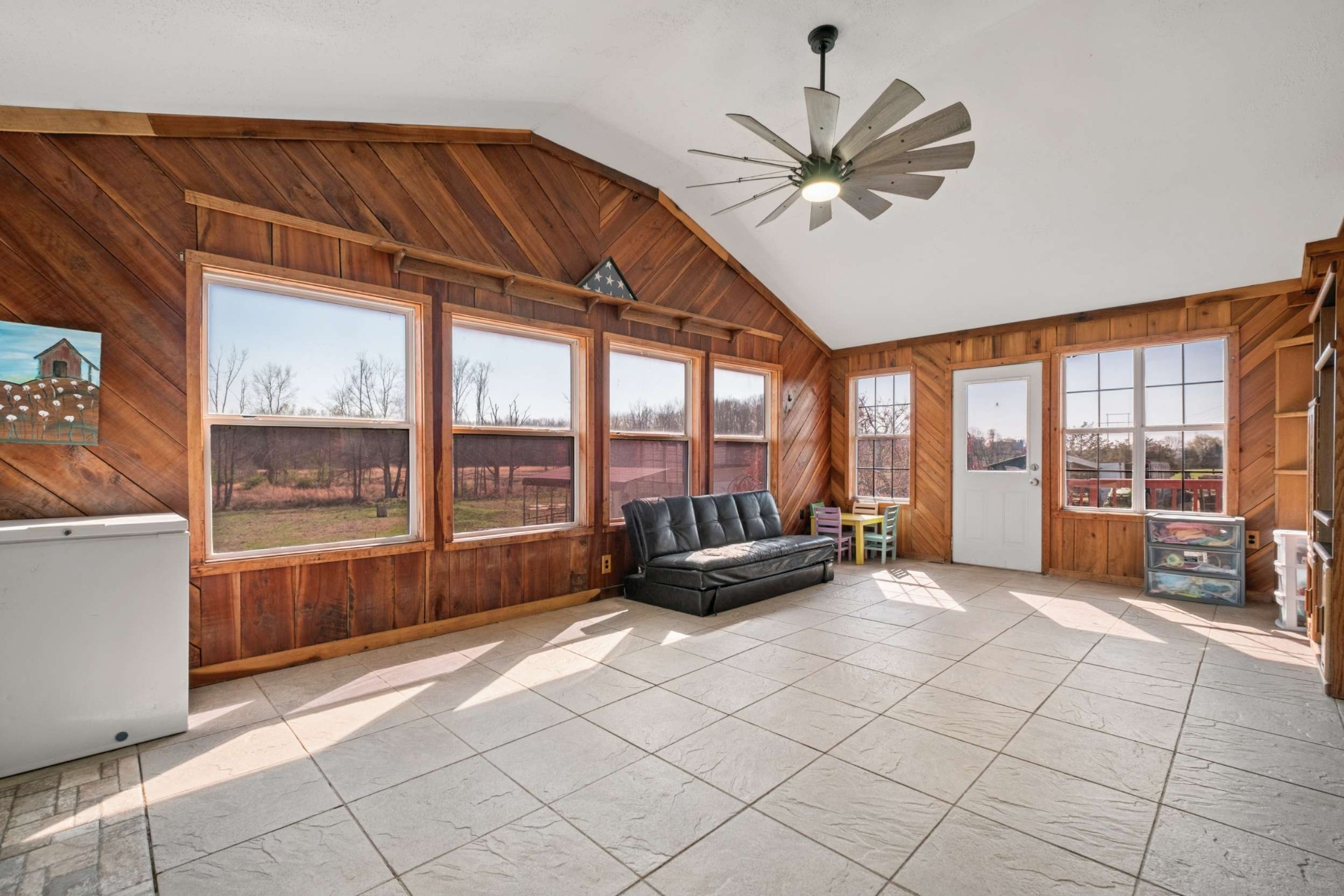 324 Laster-Holman Lane Decherd, TN 37324 - Photo 16 of 60 a living room with furniture tv and a large window