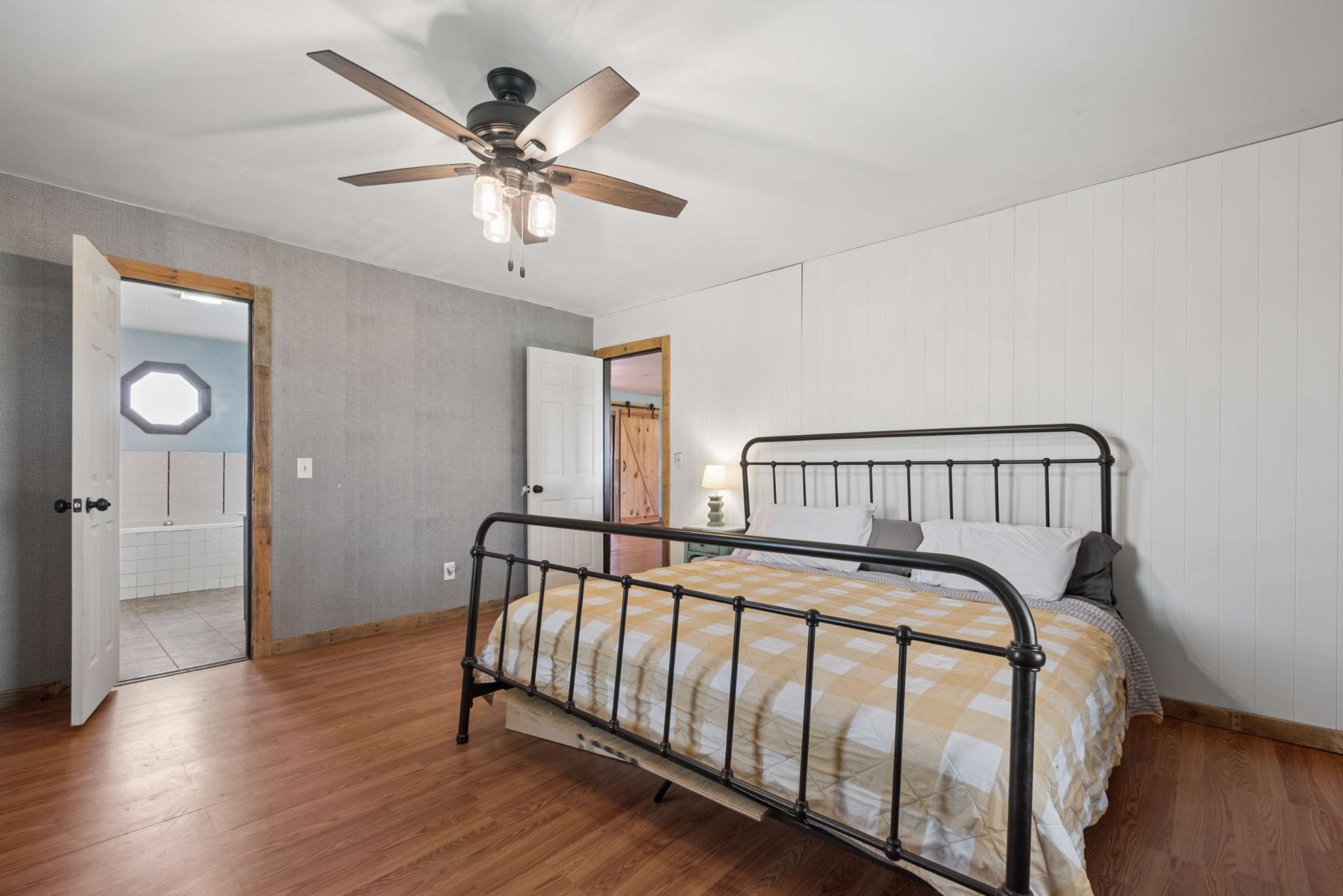 324 Laster-Holman Lane Decherd, TN 37324 - Photo 17 of 60 a view of a bedroom with wooden floor