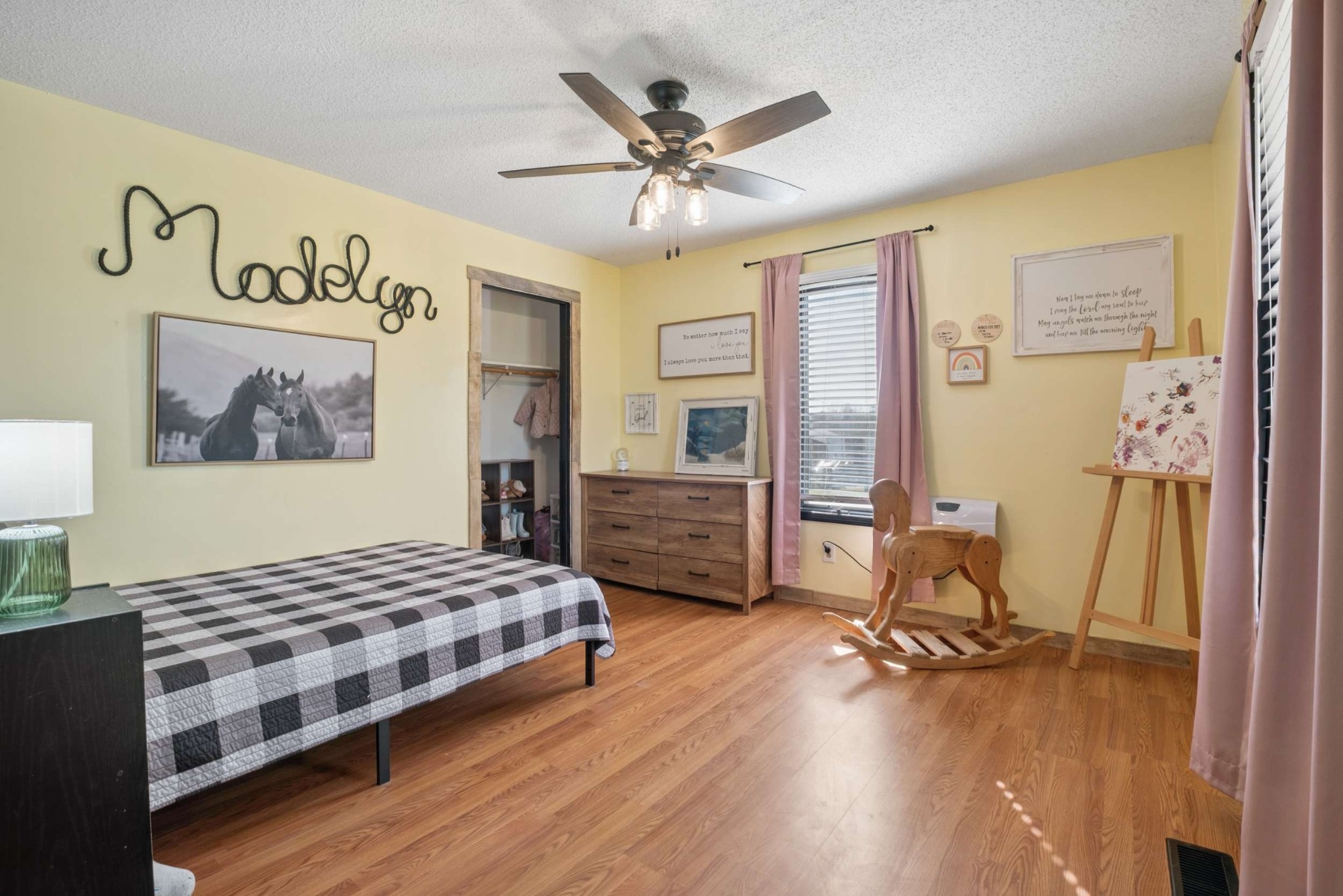 324 Laster-Holman Lane Decherd, TN 37324 - Photo 21 of 60 a bedroom with a bed and wooden floor