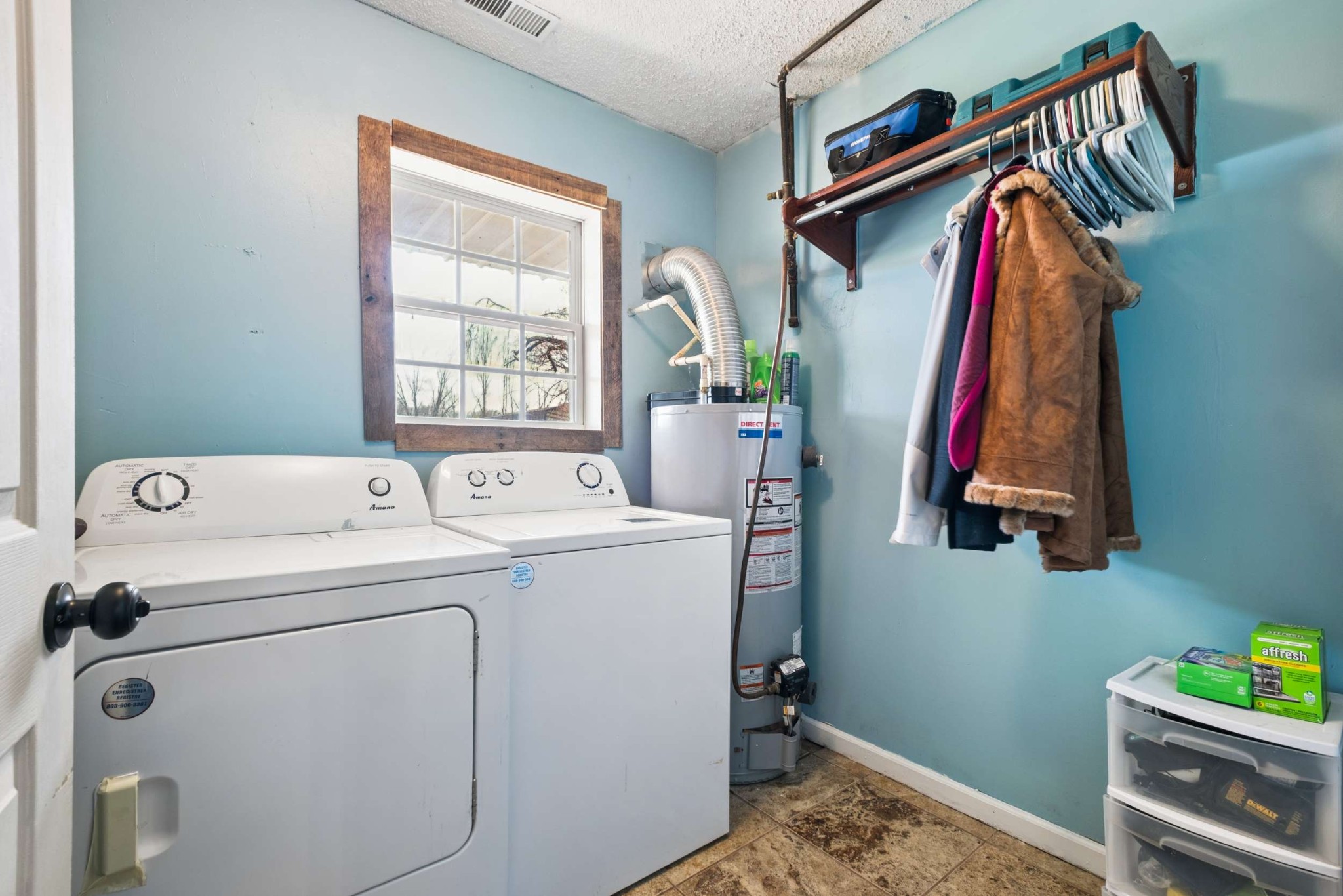 324 Laster-Holman Lane Decherd, TN 37324 - Photo 33 of 60 a view of walk in closet with clothes and shoes