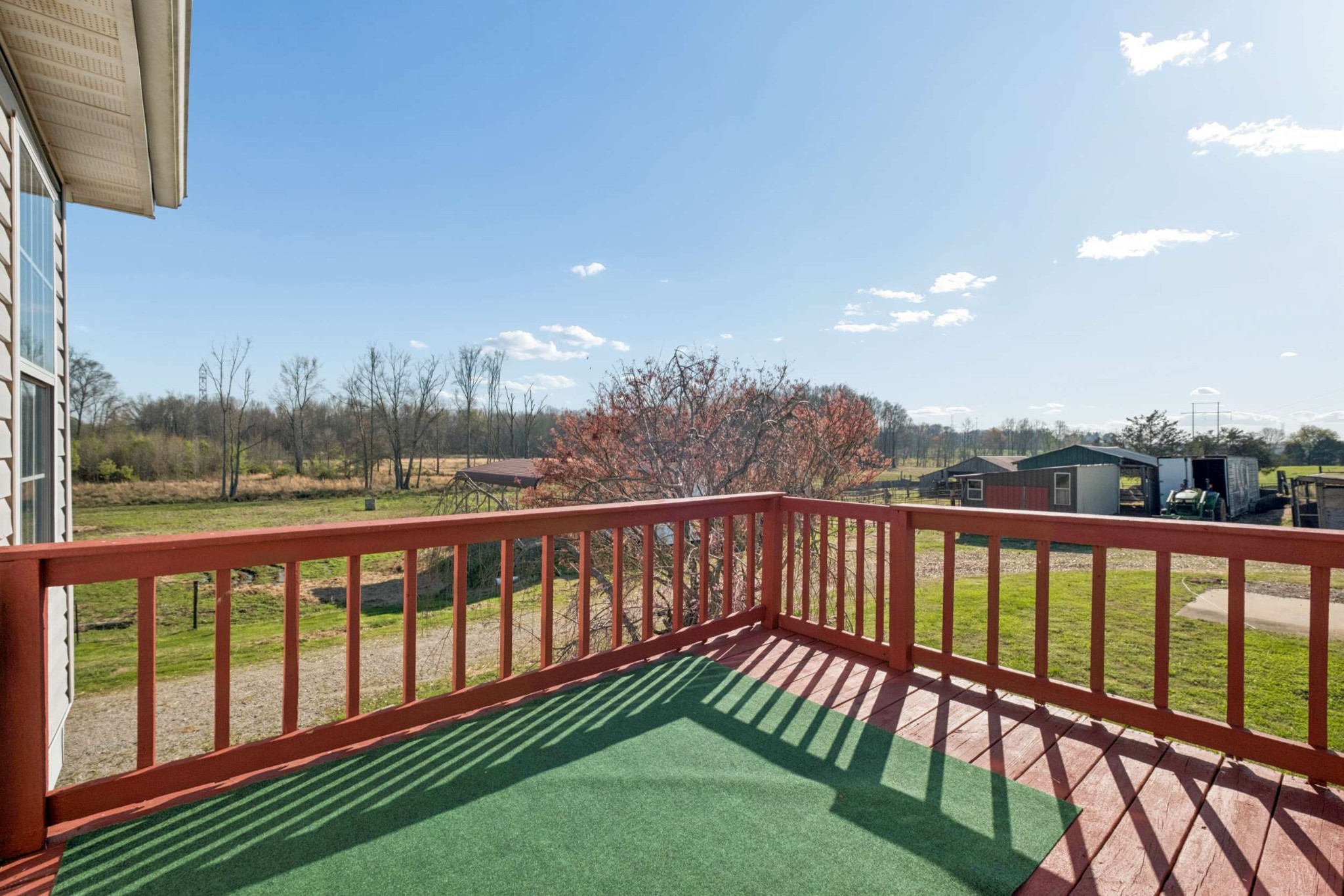 324 Laster-Holman Lane Decherd, TN 37324 - Photo 36 of 60 a view of a roof deck with wooden floor and fence