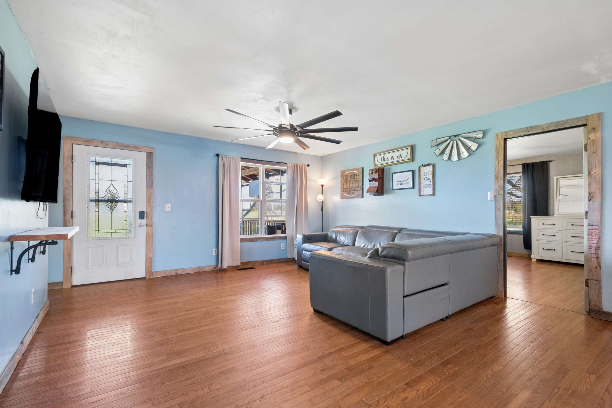 324 Laster-Holman Lane Decherd, TN 37324 - Photo 7 of 60 a living room with furniture and a flat screen tv
