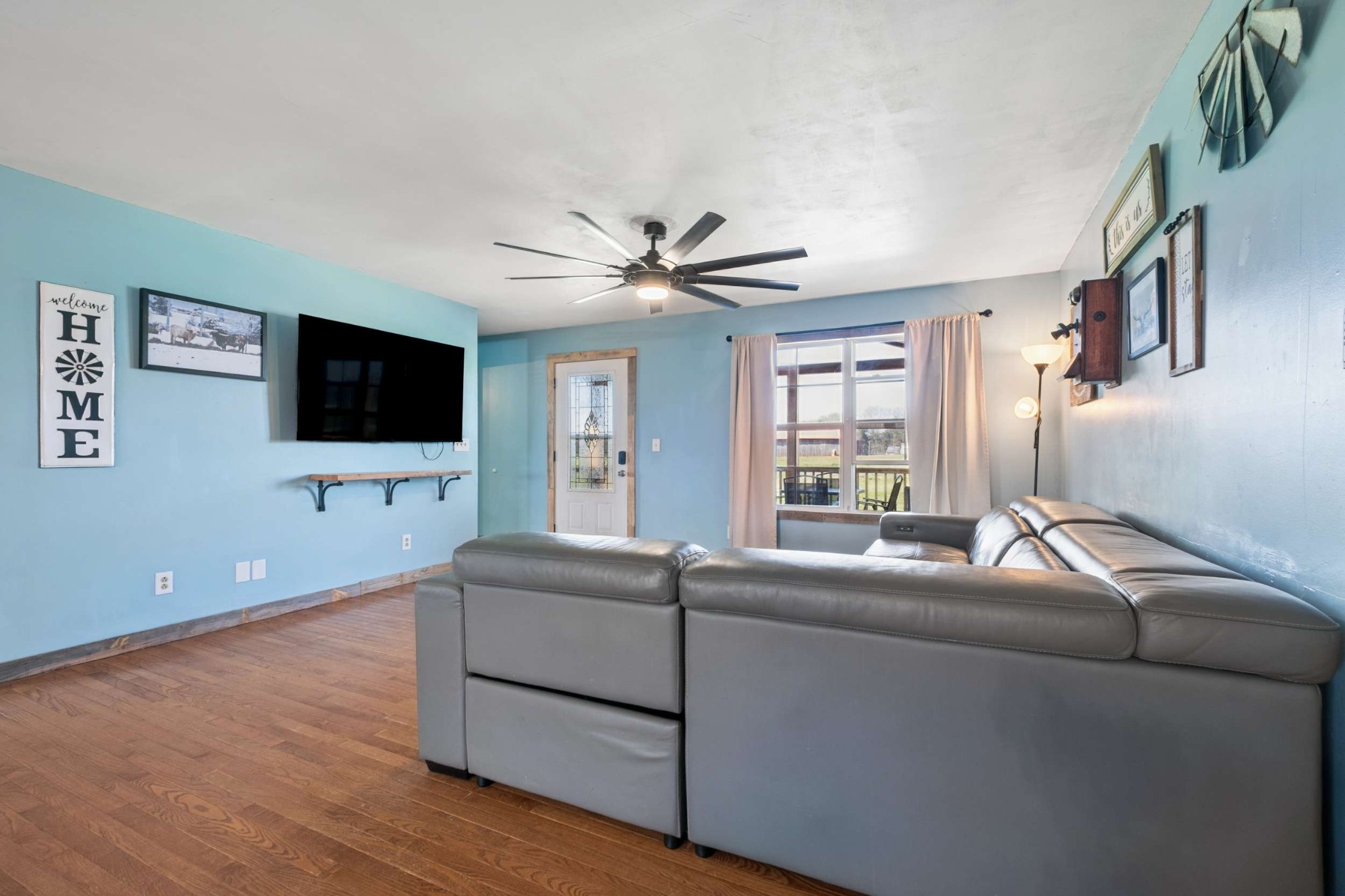 324 Laster-Holman Lane Decherd, TN 37324 - Photo 8 of 60 a living room with furniture and a flat screen tv