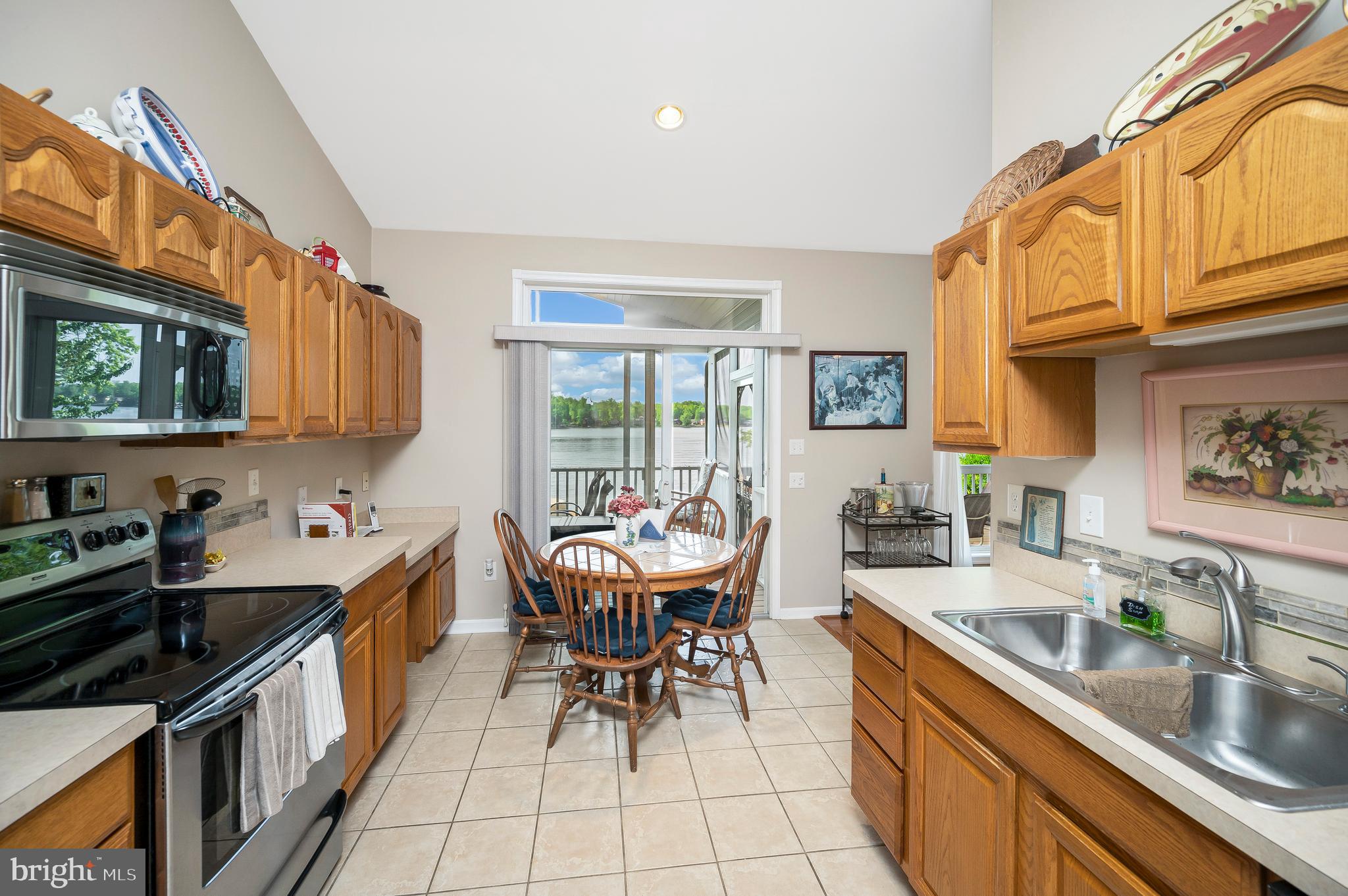 626 Cornwallis Avenue Locust Grove, VA 22508 - Photo 20 of 85 a kitchen with granite countertop lots of counter top space a sink stainless steel appliances and cabinets